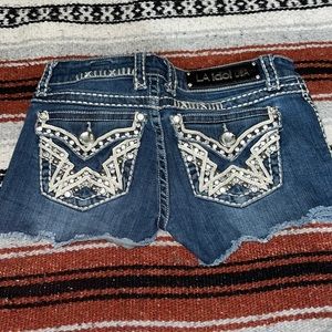 Super short ! But alot if bling